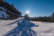 itineraire nordique izoard virage skieur en skating rayon soleil